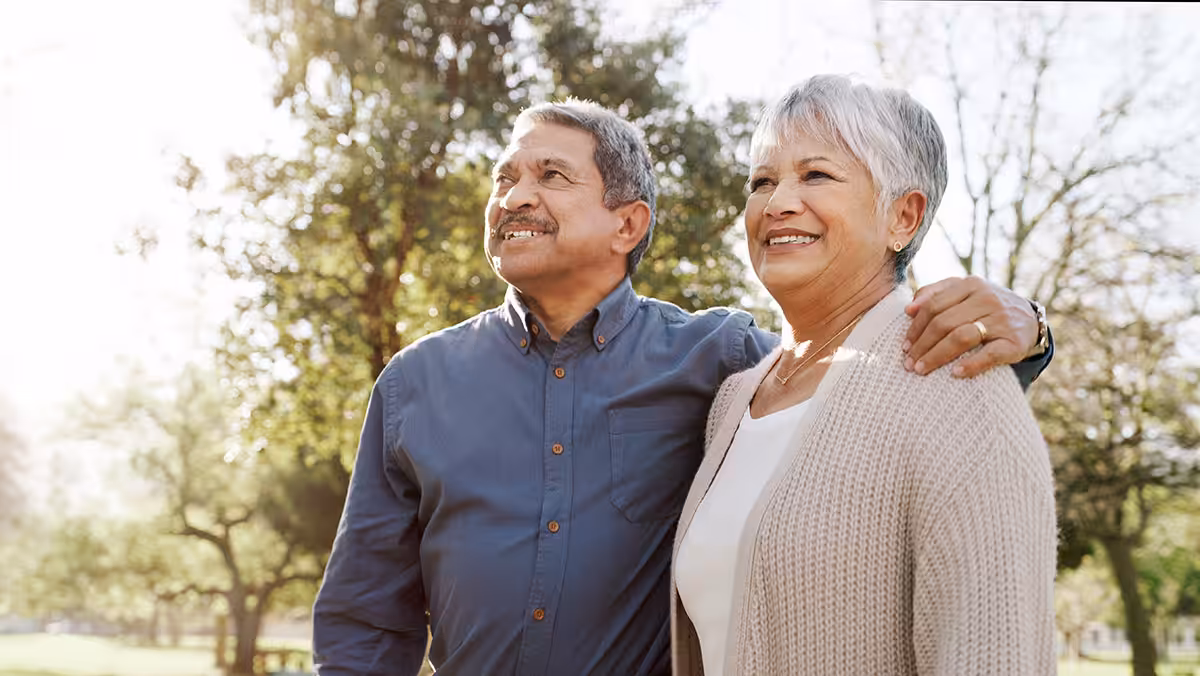 Retired couple exploring life with travel emergency and extended health coverage through ASEBP MyRetiree Plan.
