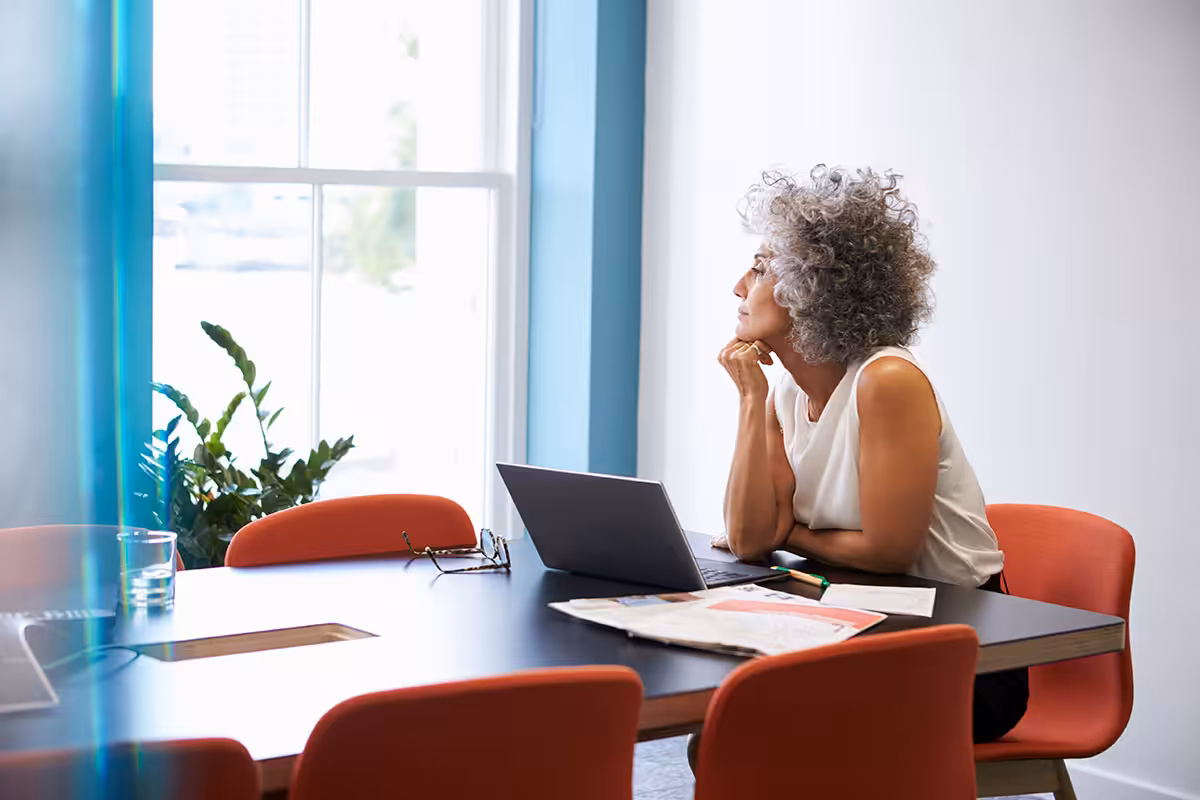 Alberta teacher reviewing ASEBP MyRetiree Plan options before retirement, researching extended health and travel benefits